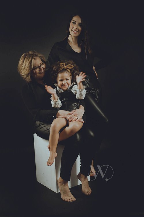 Family Photo Session In Studio With Joyful Child